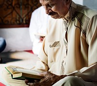 Muslims reading from the quran