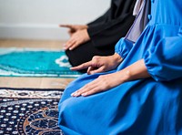 Muslim prayers in Tashahhud posture