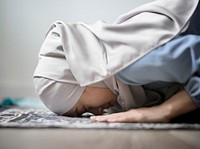 Muslim woman praying in Sujud posture