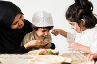 Muslim family having a meal