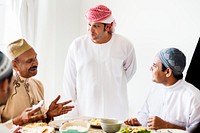 Muslim men having a meal