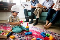 Muslim family relaxing and playing at home