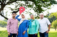 Muslim family holding up a check point symbol