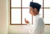 Muslim man making Dua to Allah