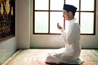 Muslim man making Dua to Allah