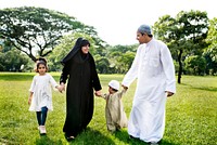 Muslim family having a good time outdoors