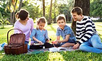 Family having a picnic in the park