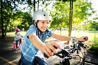 Family on a bike ride in the park