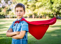 Superhero boy in the park