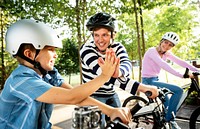 Family on a bike ride in the park