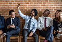 Business people taking a group selfie together