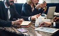 Business people working in a cafe