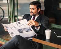 Businessman reading the daily news