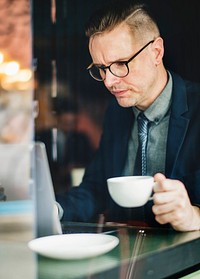 Businessman having a cup of coffee