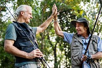 Senior friends giving a high five