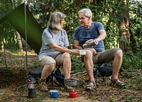 Friends having coffee at a campsite