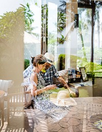 Couple waiting in a hotel lobby