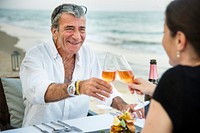 Couple enjoying a romantic dinner at the beach