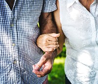 Senior couple holding each other