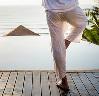 Man practicing yoga in the morning