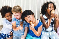 Little kids eating yummy ice cream