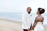 Happy couple at their beach wedding