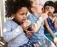 Kids eating ice cream in the summer