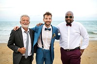 Groom and his groomsmen on the beach