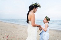 Beautiful bride with her flower girl