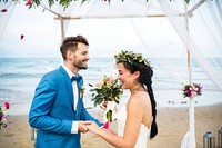 Young bride and groom at their beach wedding