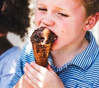 Cute kid having chocolate ice cream