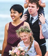 Family guests at a beach wedding