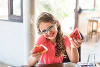 A girl holding watermelon