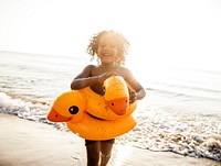 African little boy playing at the beach