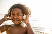 African little boy playing at the beach