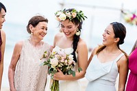 Happy bride and guests at her wedding