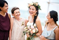 Cheerful bride at the beach