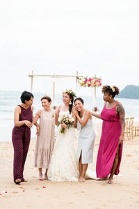 Happy bride and guests at her wedding