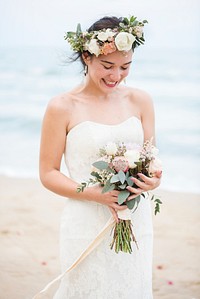 Beautiful bride by the sea