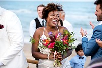 Happy bride and groom in a wedding ceremony at a tropical island