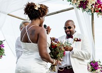 Happy bride and groom in a wedding ceremony at a tropical island