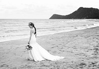 Beautiful bride by the sea
