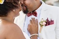African American couple getting married at an island