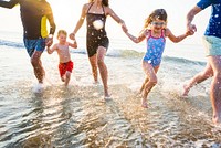 Family playing at the beach