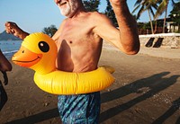 Adult having fun with baby duck tube