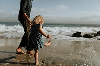 Father and daughter at a beach