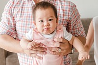 Cute Asian baby standing up