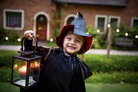 Little girl dressed up as a witch