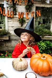 Little girl dressed up as a witch