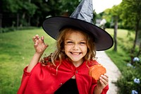 Little girl dressed up as a witch